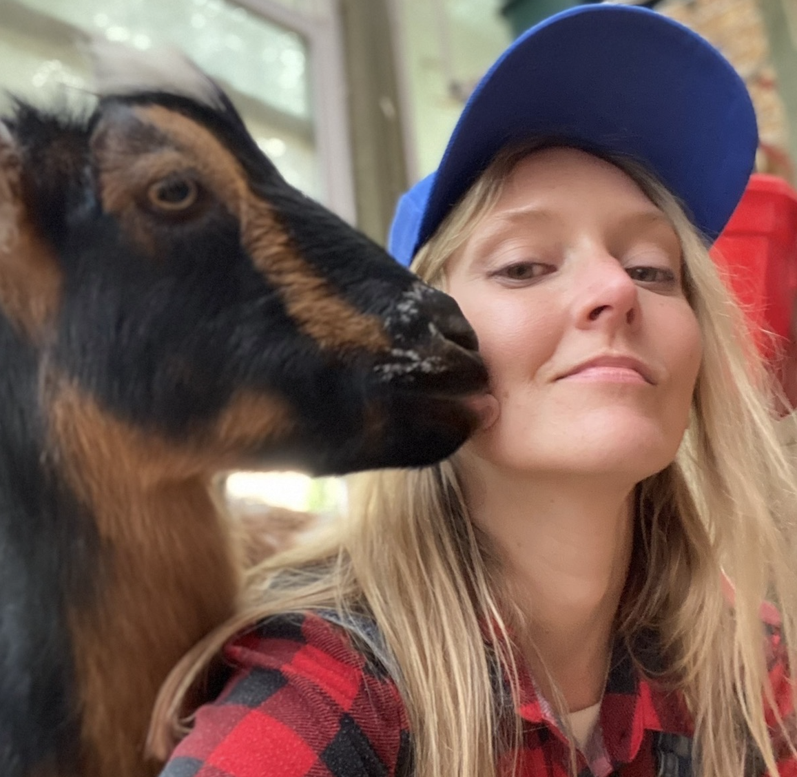 Katie MacBride and one of her goats, Jack. 